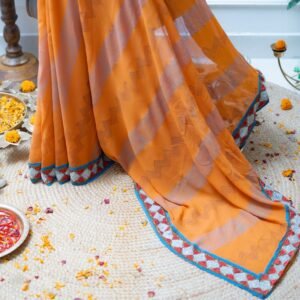 RUST PURE GEORGETTE WITH BEAUTIFUL HANDWORK BORDER OF CUT DANA